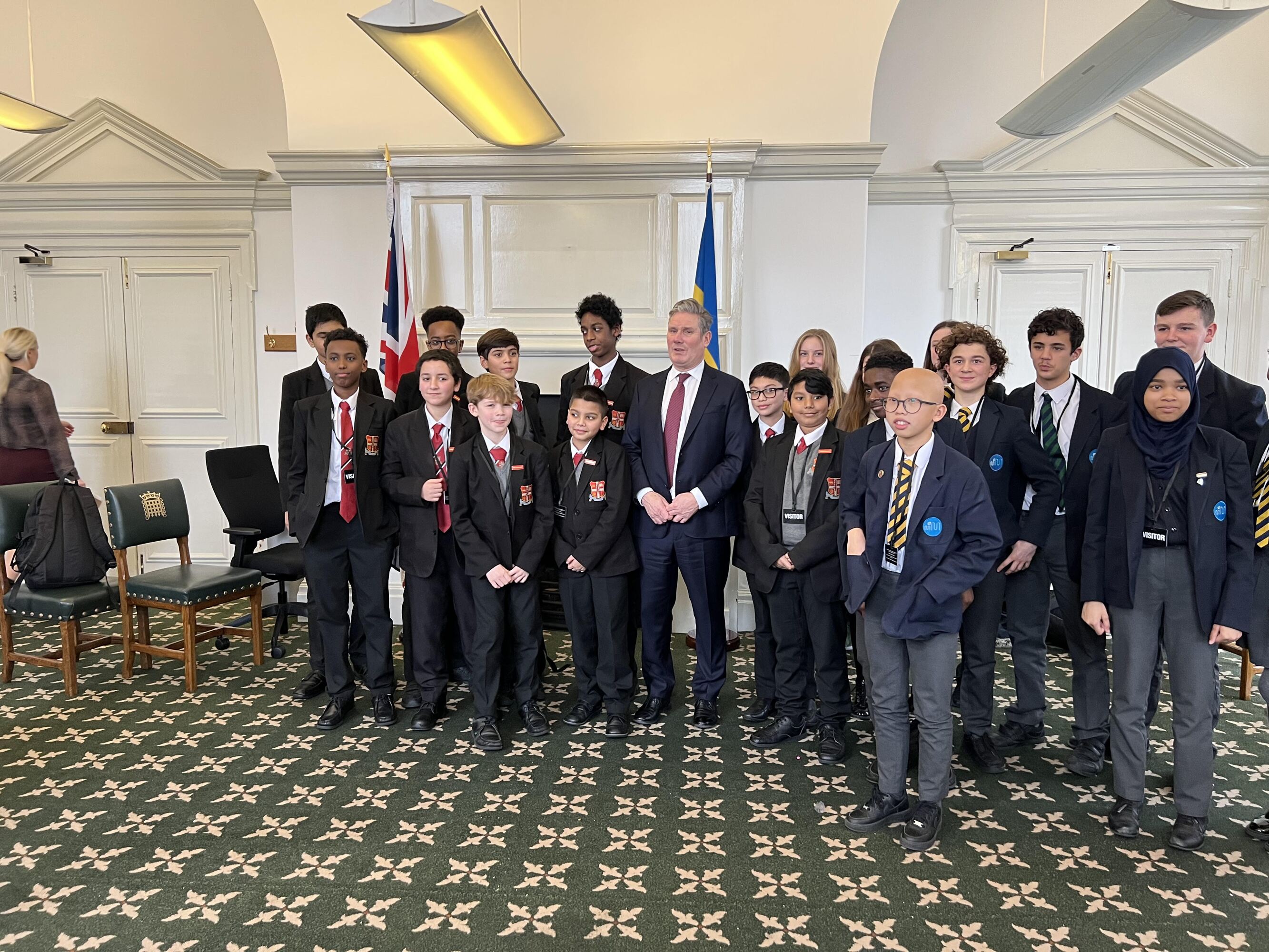 Sir Keir Starmer stands in the centre of a group of students from St Mary Magdalene Academy, Islington